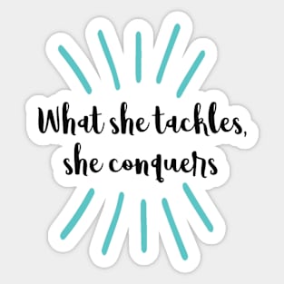 What she tackles, she conquers quote Sticker